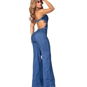 Tuta in denim blu senza schienale con ritagli laterali e gamba larga per le donne