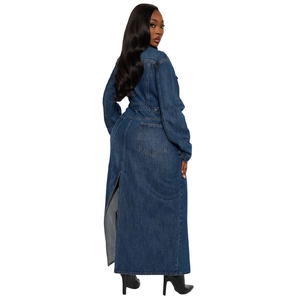 Macro shot of the back slit and pocket details on a deep blue denim maxi coat dress
