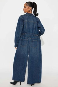 Detail of deep blue denim maxi coat with long sleeves and wide leg silhouette