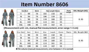 Detailed size chart with measurements for slim fit denim jumpsuit with flared sleeves