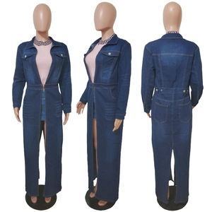 Three-way view of a long dark blue denim trench coat with waist belt and chest pockets