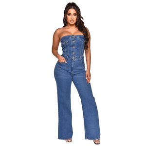 Sleeveless denim jumpsuit with tube top design and flared wide leg pants in mid-blue wash