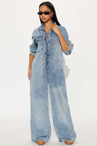Detail of light blue washed denim jumpsuit with vintage lapel and front chest pocket