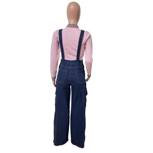 Rear view of wide-leg denim overalls and pink knit top with Greek fret trim detailing