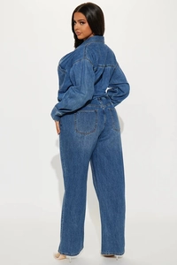 Slim fit long sleeve denim jumpsuit for women in mid-blue wash with utility chest pocket