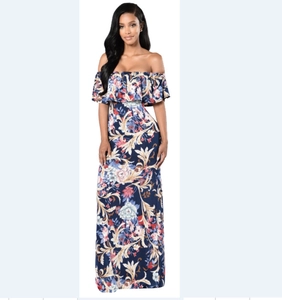 Close-up of bohemian floral print off-shoulder maxi dress with elegant ruffle detail