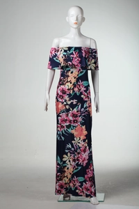 Macro shot of tropical floral print and ruffle details on off-shoulder long dress