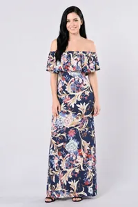 Off-shoulder floral bohemian maxi dress with ruffle neckline and vintage floral pattern
