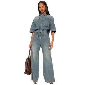 Slim fit blue denim jumpsuit with drawstring waist and wide leg cut for women