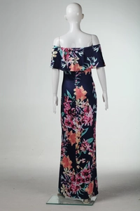 Detail of the ruffle off-shoulder neckline on a navy blue floral bohemian maxi dress