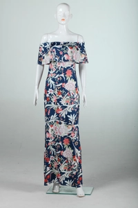 Close-up of the ruffled off-the-shoulder neckline on a blue floral bohemian maxi dress