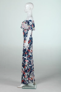 Detail view of floral print off-shoulder maxi dress with wide ruffle neckline and deep blue fabric