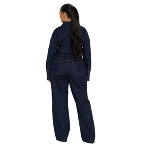 Rear view of plus size dark blue denim jumpsuit with contrasting yellow stitching detail