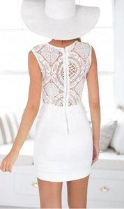Elegant white sleeveless bodycon dress featuring floral lace back and zipper detail