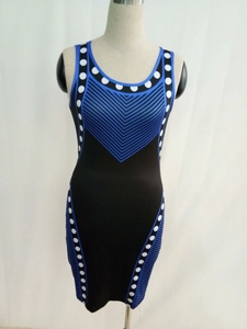 Elegant sleeveless slim fit dress with blue geometric pattern and polka dots print