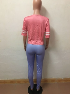 Rear view detail of casual pink short sleeve top and light blue leggings sporty set