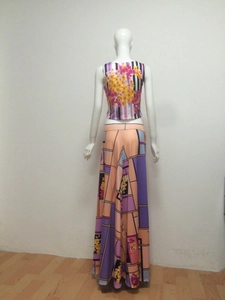 Women's 2-piece floral print crop top and high waist maxi skirt set from back view