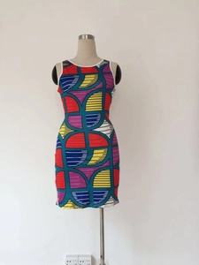 Detail of a sleeveless bodycon mini dress with multi-color geometric print on a mannequin