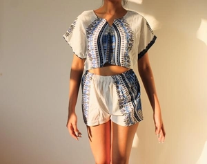 Bohemian print two-piece summer set featuring a white crop top and matching shorts