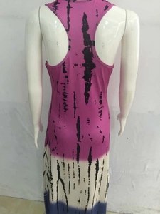 Detail of racerback maxi dress featuring pink and blue tie-dye stripe print and soft fabric