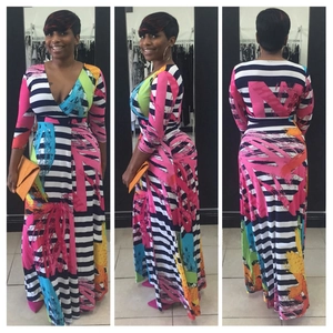 Maxi dress details with striped pattern and colorful spray graffiti on V-neck long sleeve