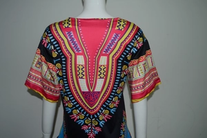 Back view of vintage ethnic dashiki print short sleeve dress in black with vibrant patterns