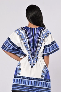 Back view of a white Dashiki print dress showing ethnic patterns and elastic waist