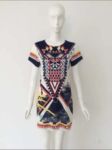 Detailed view of the ethnic geometric print on this vintage short sleeve dress
