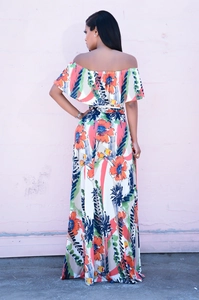 Rear view of vibrant floral maxi dress with off-shoulder ruffles and high waist design