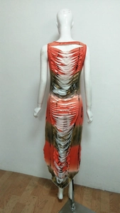 Detail of gradient orange to olive green sleeveless dress with back hollow cut-out design