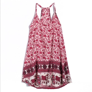 Detail view of Bohemian slip dress featuring elephant prints and racerback design
