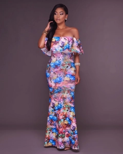Detail of off-shoulder floral maxi dress with vibrant ruffles and slim mermaid silhouette