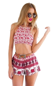 Two-piece bohemian red floral set with halter crop top and printed shorts for summer