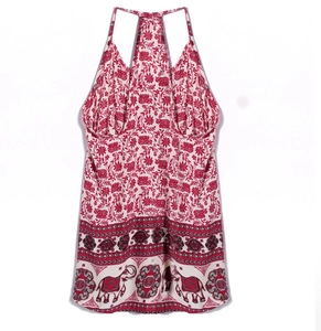 Detail of elephant and floral ethnic print on a white bohemian racerback summer dress