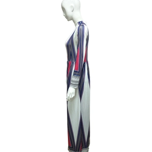 Side view of long-sleeve maxi dress with colorful geometric stripes and stand collar