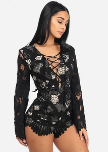 Chic black floral lace long sleeve romper with deep V-neck and lace-up front detail