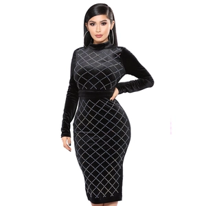 Elegant black velvet long sleeve midi dress with sparkling white rhinestone patterns