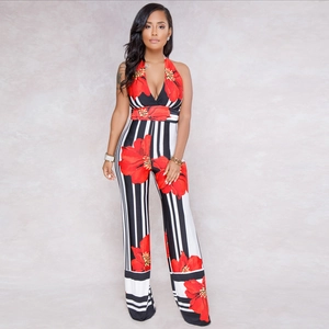 Detailed view of women's halter jumpsuit with vibrant red floral print and striped pattern