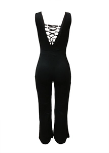 Detailed back view of sexy black backless jumpsuit with lace-up metal ring straps