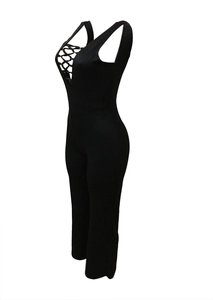 Detailed view of women's black lace-up front jumpsuit with deep V-neck and open back