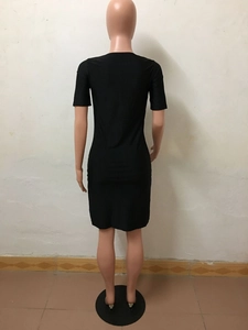 Back view of black short sleeve bodycon midi dress displayed on a mannequin