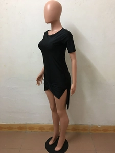Detail of black short sleeve dress with side knot and asymmetrical ruffled hem design
