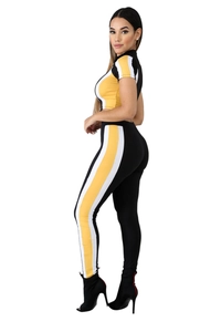 Close-up of side view showing color block patchwork on the women's sporty two-piece set