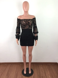 Detail of sexy black lace off-shoulder mini dress with sheer mesh sleeve accents