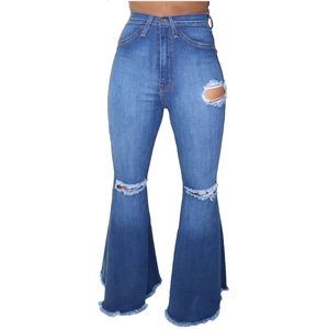 Women's high waist flared jeans with distressed ripped knees and frayed hems in dark blue