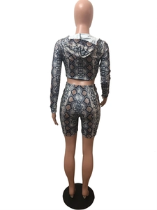 Rear view of long sleeve snakeskin print two-piece set featuring high-waist shorts