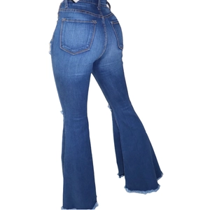 Slim fit high waist flare jeans in dark blue with distressed raw hem and back pockets