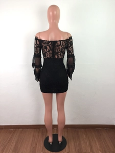 Back view of a black lace off-shoulder dress featuring sheer sleeves and layered ruffles