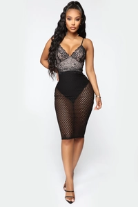 Close-up of black lace patchwork and mesh sheer midi dress with fine shoulder straps
