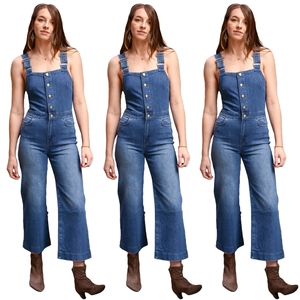 Slim fit dark blue denim jumpsuit with gold buttons and wide-leg cut for women